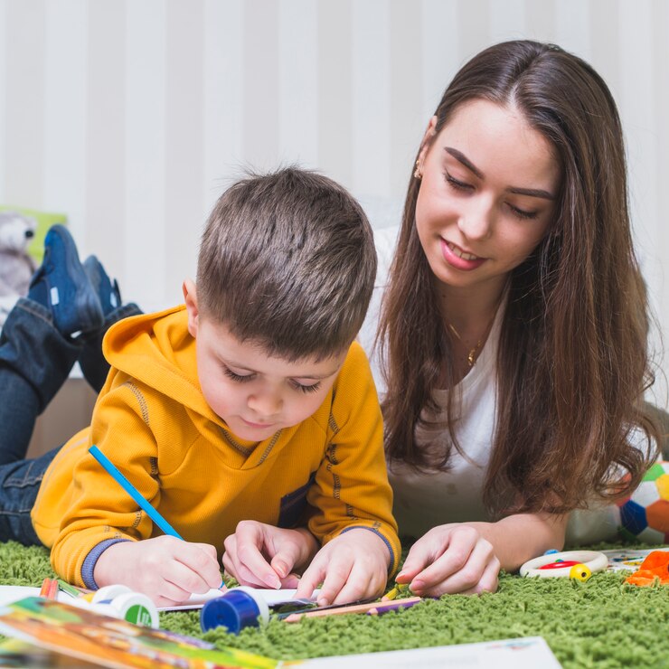 woman-drawing-with-boy_23-2147797878